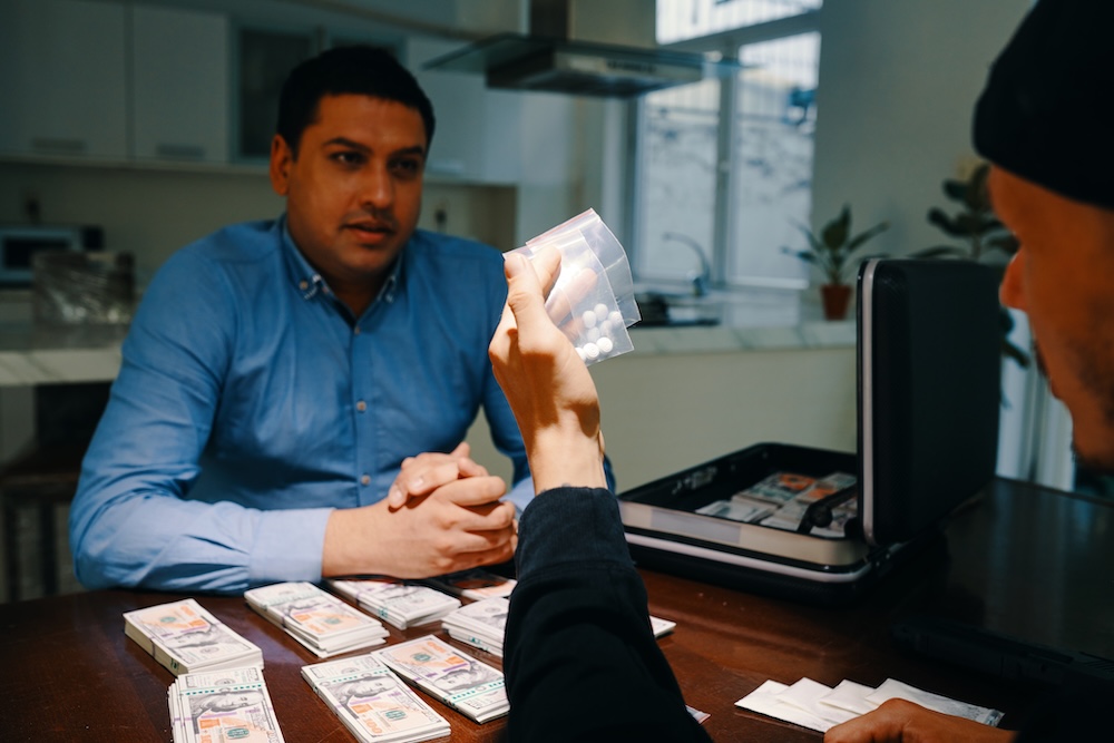 a man dealing drugs